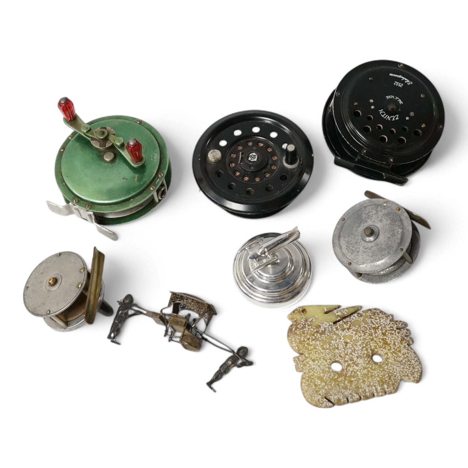 Sundry items comprising five fishing reels, a Chinese silver sedan chair and a Chinese jade comb. Condition - mostly fair